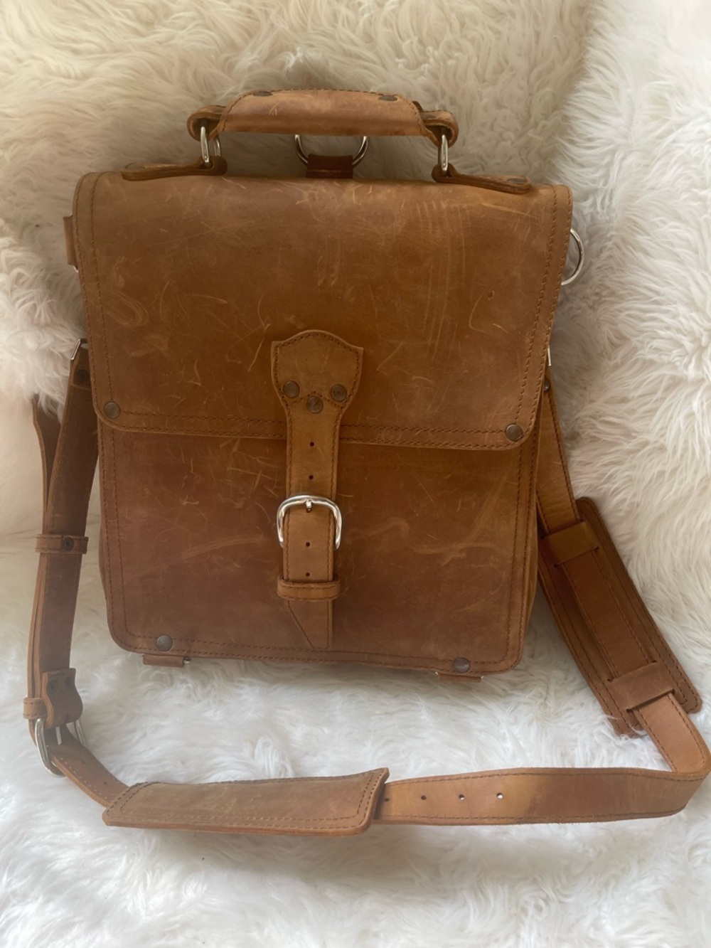 Saddleback Leather Brown convertible Messenger/backpack with. Removable divider